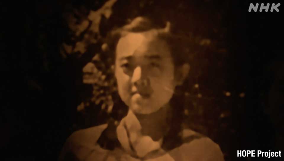 Akiko di masa remaja. Saat tiba di rumah pada hari pengeboman, ia tampak tidak terluka. Kata-kata terakhirnya: Ibu, aku ingin makan tomat merah.