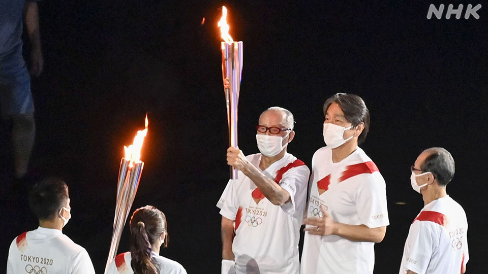 Nagashima dalam kirab obor bersama Matsui dan Oh.