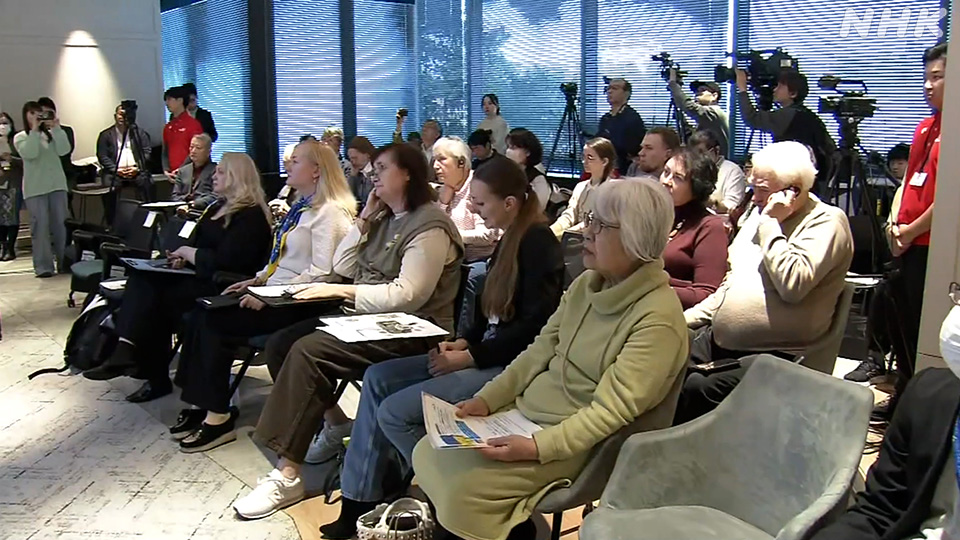 Para pengungsi berkumpul dalam sebuah acara di Tokyo pada 21 Februari.