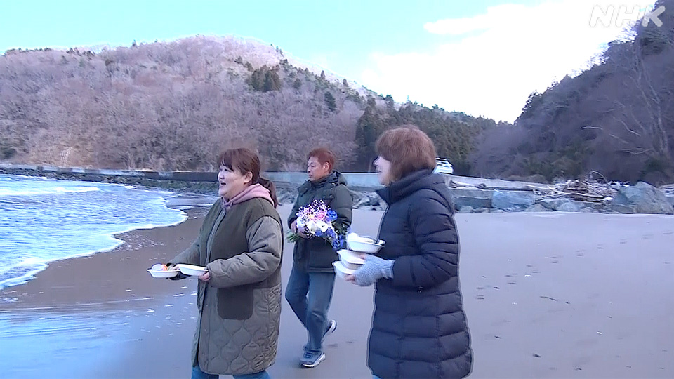 Miho dan Yoshiaki tersenyum saat menyerukan nama anak-anak mereka pada 11 Maret 2026.