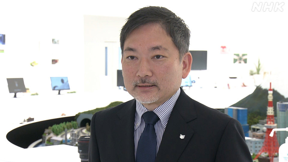Pejabat Canon, Toyoda Jin, saat berbicara kepada NHK World.