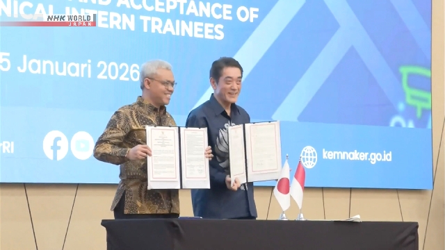 Suasana profesional di Jepang yang menggambarkan integrasi tenaga kerja asing di berbagai sektor industri.