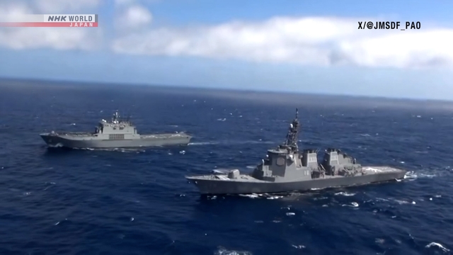 Visualisasi kapal perusak Jepang dan kapal militer Korea Selatan dalam latihan penyelamatan gabungan di perairan Nagasaki.