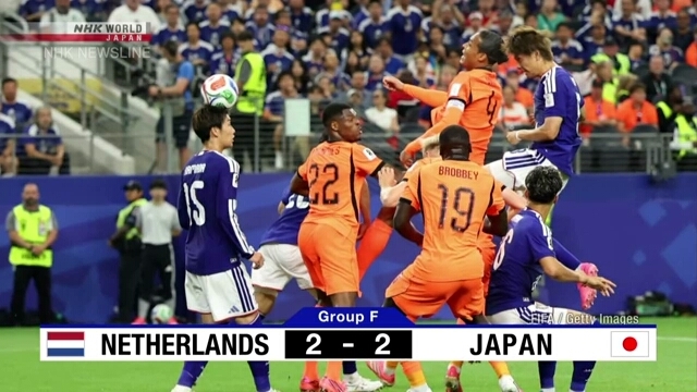 Aksi pemain tim nasional sepak bola Jepang saat menghadapi Belanda dalam pertandingan pembuka Piala Dunia.