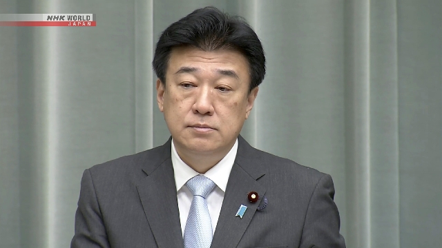 Juru bicara utama pemerintah Jepang, Kihara Minoru, berbicara kepada wartawan tentang penahanan dua warga Jepang di China.