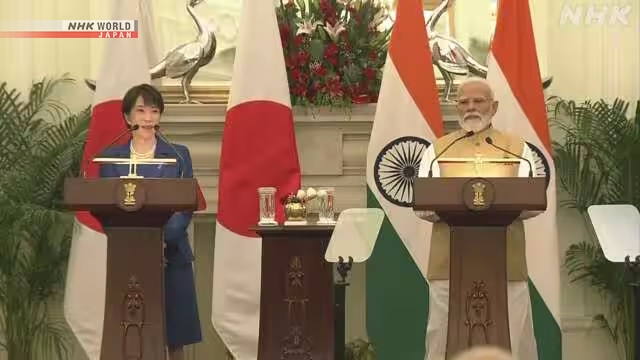 Perdana Menteri Jepang Takaichi Sanae berjabat tangan dengan Perdana Menteri India Narendra Modi usai pembicaraan tingkat tinggi.